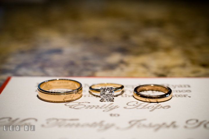 Wedding band, wedding ring, and diamond engagement ring close up shot. Saint John the Evangelist church wedding ceremony photos at Severna Park, Maryland by photographers of Leo Dj Photography. http://leodjphoto.com