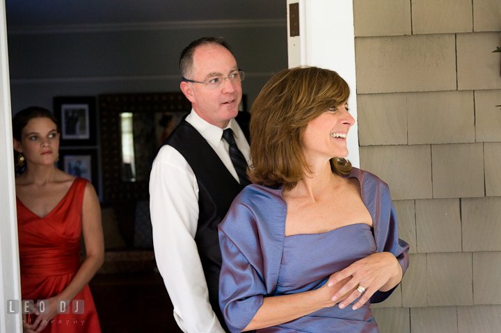 Bride's parent admiring how beautiful their daughter looked. Saint John the Evangelist church wedding ceremony photos at Severna Park, Maryland by photographers of Leo Dj Photography. http://leodjphoto.com