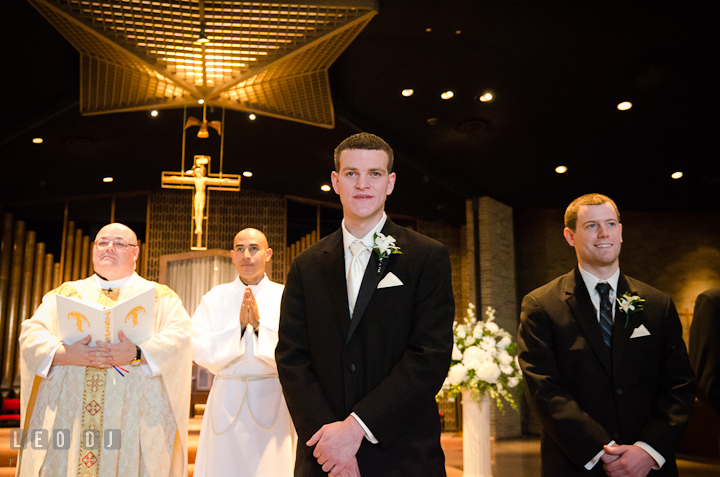 Groom admiring Bride in her dress at their first glance. Saint John the Evangelist church wedding ceremony photos at Severna Park, Maryland by photographers of Leo Dj Photography. http://leodjphoto.com