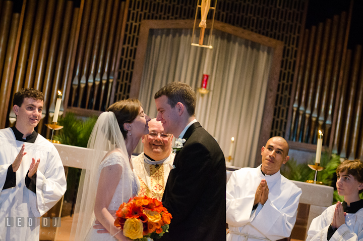 Bride and Groom getting ready to kiss. Saint John the Evangelist church wedding ceremony photos at Severna Park, Maryland by photographers of Leo Dj Photography. http://leodjphoto.com