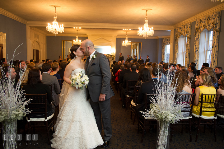 Bride and Groom kissed during recessional. The Tidewater Inn wedding, Easton, Eastern Shore, Maryland, by wedding photographers of Leo Dj Photography. http://leodjphoto.com