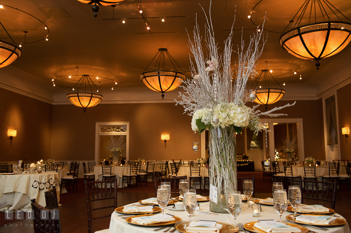 High vertical flower decor for table centerpiece by florist Monteray Farms. The Tidewater Inn wedding, Easton, Eastern Shore, Maryland, by wedding photographers of Leo Dj Photography. http://leodjphoto.com