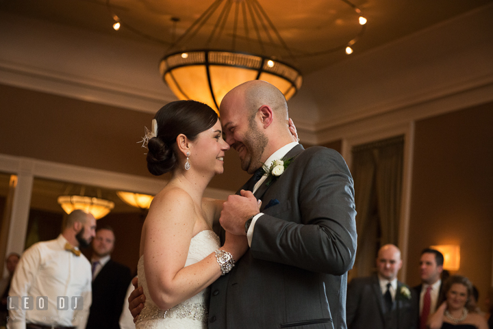 Bride and Groom smiling during first dance. The Tidewater Inn wedding, Easton, Eastern Shore, Maryland, by wedding photographers of Leo Dj Photography. http://leodjphoto.com