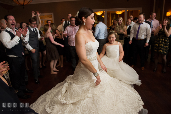 Bride and flower girl twirling their dresses together. The Tidewater Inn wedding, Easton, Eastern Shore, Maryland, by wedding photographers of Leo Dj Photography. http://leodjphoto.com