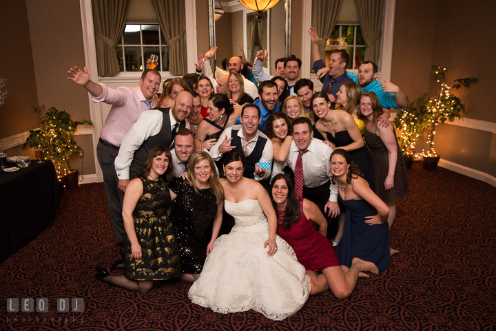 A photo group shot of Bride and Groom and their college and high school friends. The Tidewater Inn wedding, Easton, Eastern Shore, Maryland, by wedding photographers of Leo Dj Photography. http://leodjphoto.com