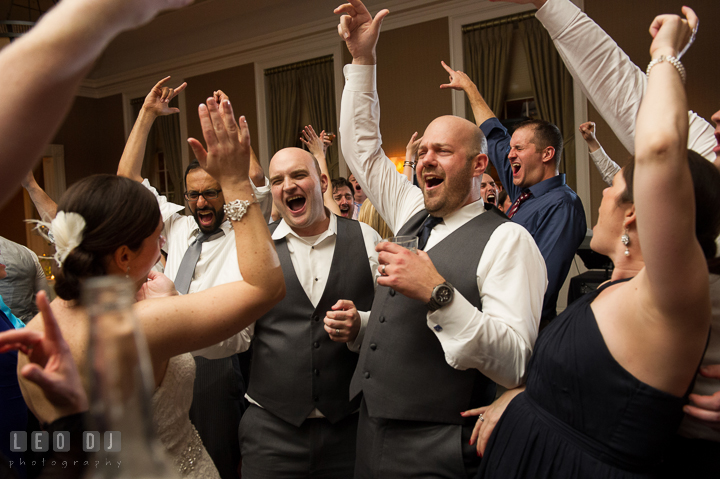 Bride and Groom singing along their favorite song played by DJ from Absolute Entertainment. The Tidewater Inn wedding, Easton, Eastern Shore, Maryland, by wedding photographers of Leo Dj Photography. http://leodjphoto.com