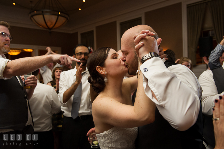 Bride and Groom kissing at the end of the reception party dance. The Tidewater Inn wedding, Easton, Eastern Shore, Maryland, by wedding photographers of Leo Dj Photography. http://leodjphoto.com