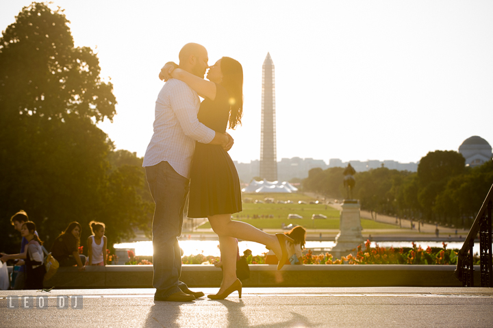 Engaged couple almost kissing with the Washington Monument in the background. Washington DC pre-wedding engagement photo session, by wedding photographers of Leo Dj Photography. http://leodjphoto.com