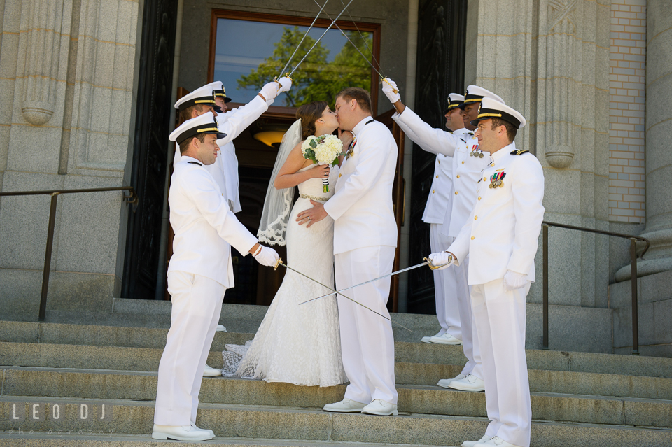 Bride and Groom exiting the USNA Chapel through the swords arch. USNA, US Naval Academy military wedding at Annapolis Maryland, by wedding photographers of Leo Dj Photography. http://leodjphoto.com