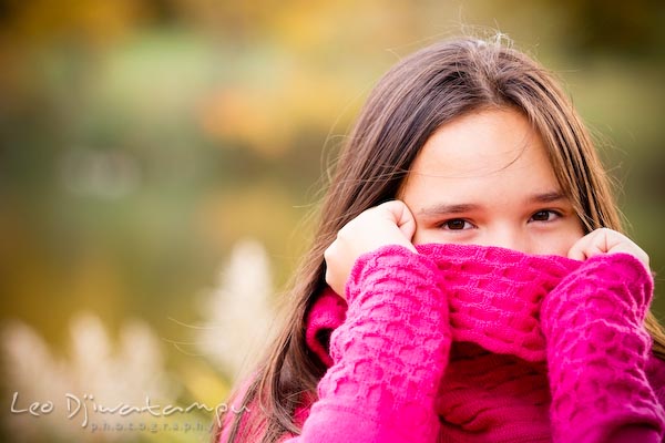 Girl cover face, mouth, nose, with pink sweater. Commercial comp card photograper Kent Island Annapolis MD Washington DC