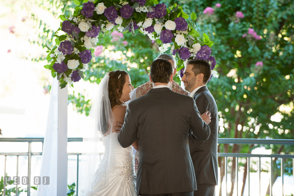 Bride and Groom all smiles at start of the wedding ceremony. Harbour View Events Woodbridge Virginia wedding ceremony and reception photo, by wedding photographers of Leo Dj Photography. http://leodjphoto.com