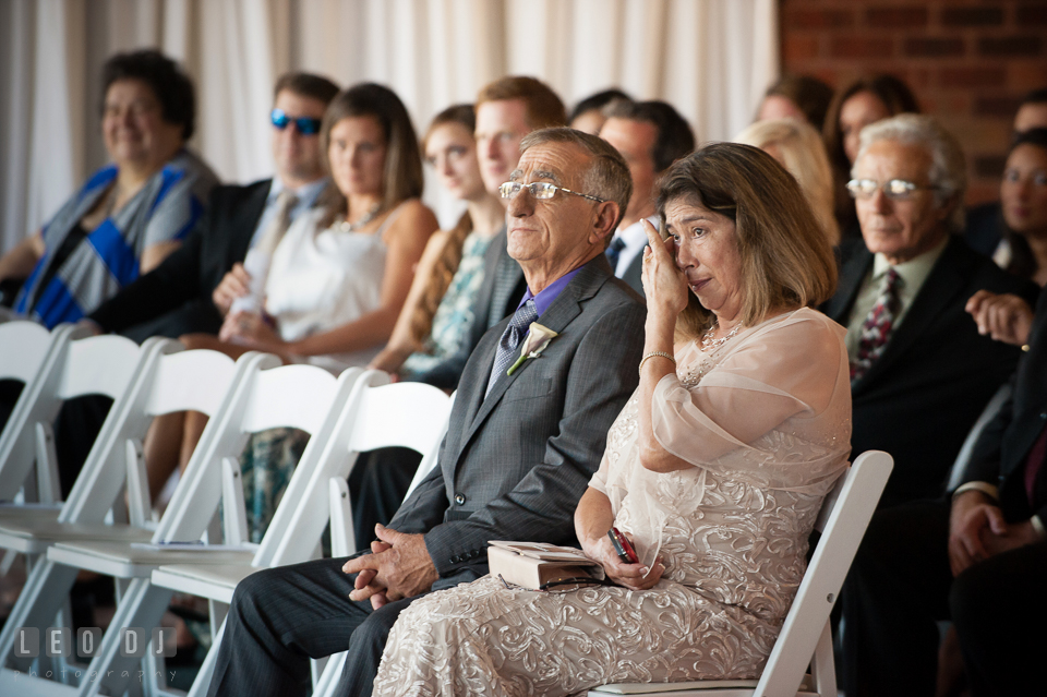 Groom's Mother and Father shed tear during wedding ceremony. Harbour View Events Woodbridge Virginia wedding ceremony and reception photo, by wedding photographers of Leo Dj Photography. http://leodjphoto.com