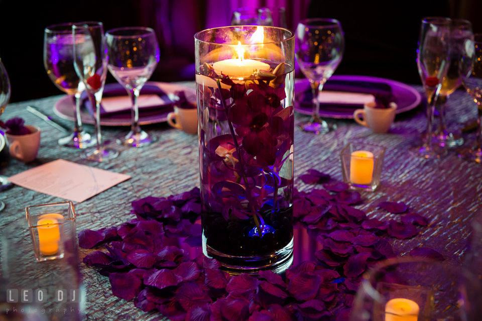 Table centerpieces with purple orchid blooms from DaVinci Florist. Harbour View Events Woodbridge Virginia wedding ceremony and reception photo, by wedding photographers of Leo Dj Photography. http://leodjphoto.com