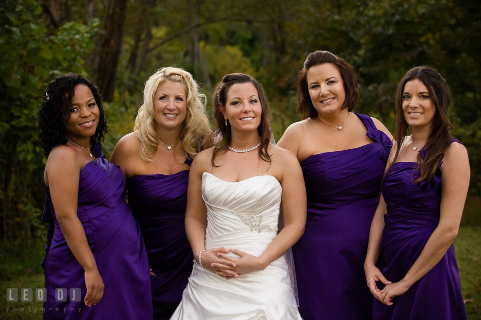 Bride posing with her Bride's party, consisting the Maid of Honor and Bridesmaids. Harbour View Events Woodbridge Virginia wedding ceremony and reception photo, by wedding photographers of Leo Dj Photography. http://leodjphoto.com