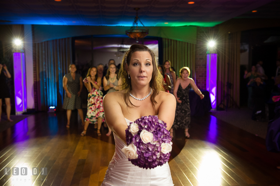 Bride getting ready to toss her wedding bouquet. Harbour View Events Woodbridge Virginia wedding ceremony and reception photo, by wedding photographers of Leo Dj Photography. http://leodjphoto.com