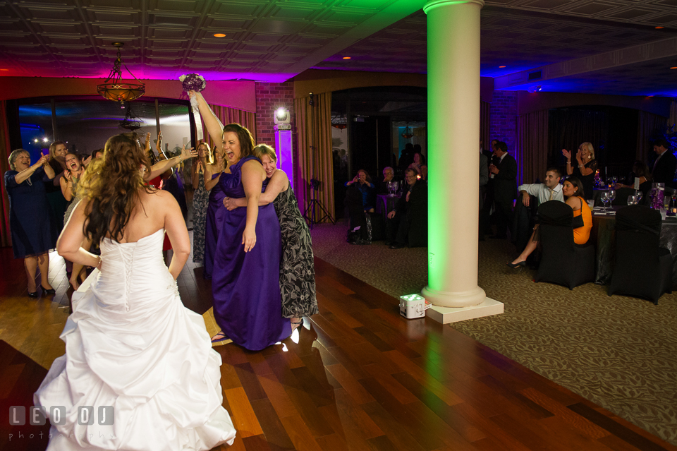 The winner who caught the bouquet toss was one of the Bridesmaid. Harbour View Events Woodbridge Virginia wedding ceremony and reception photo, by wedding photographers of Leo Dj Photography. http://leodjphoto.com