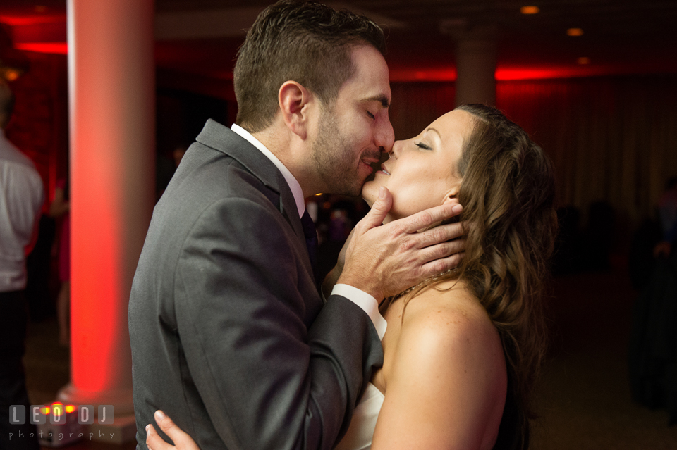 Kiss from the Groom to the Bride during open dance. Harbour View Events Woodbridge Virginia wedding ceremony and reception photo, by wedding photographers of Leo Dj Photography. http://leodjphoto.com