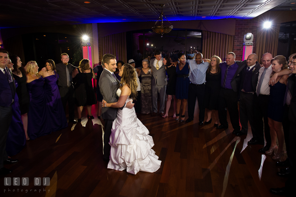 Bride and Groom dancing together with guests circling them. Harbour View Events Woodbridge Virginia wedding ceremony and reception photo, by wedding photographers of Leo Dj Photography. http://leodjphoto.com