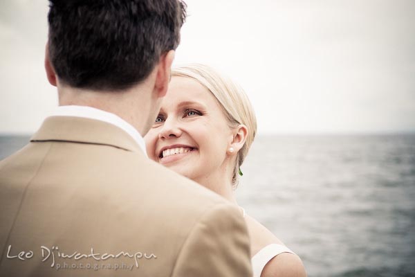 bride smiling at groom. Annapolis Kent Island MD Modern Intimate Candid Posed Photojournalistic Style Wedding Photographer