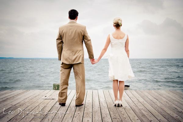 bride groom at pier/dock looking at water at chesapeake bay. Annapolis Kent Island MD Modern Intimate Candid Posed Photojournalistic Style Wedding Photographer