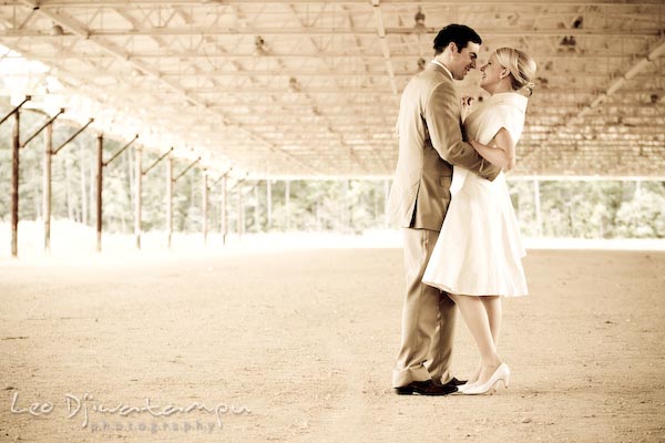 bride groom slow dance, dancing under an abandoned warehouse structure. Annapolis Kent Island MD Modern Intimate Candid Posed Photojournalistic Style Wedding Photographer