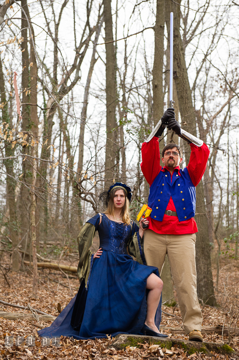 Engaged couple posing like Leia and Luke Skywalker on the original Star Wars movie poster. Renaissance Costume Cosplay fun theme pre-wedding engagement photo session at Maryland, by wedding photographers of Leo Dj Photography. http://leodjphoto.com