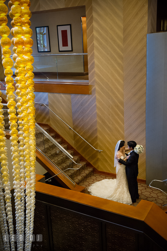 Sheraton Hotel Reston Virginia Bride and Groom hugging on the stairs photo by Leo Dj Photography