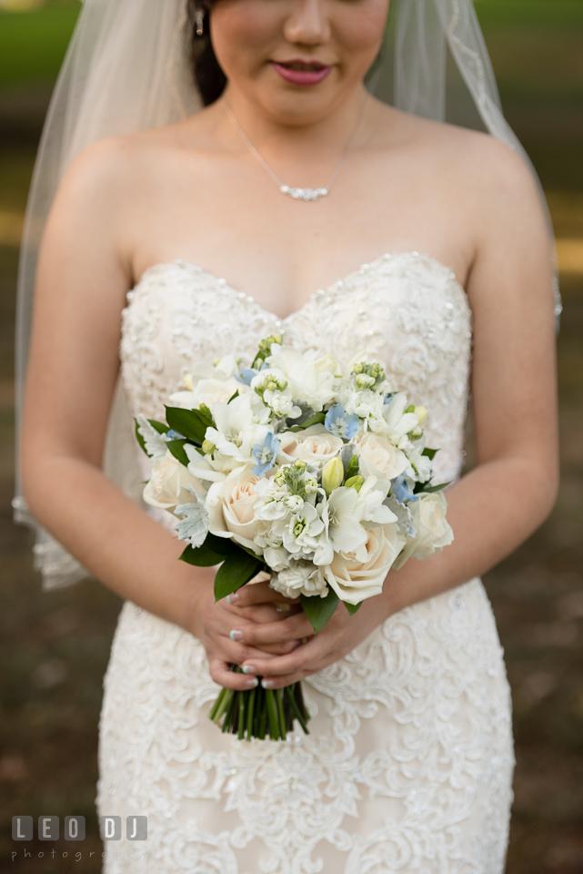 Hidden Creek Country Club Bride holding bouquet by Maryam Flowers photo by Leo Dj Photography