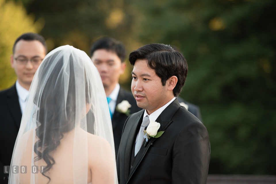 Reston Virginia Wedding Groom reciting vow to Bride photo by Leo Dj Photography