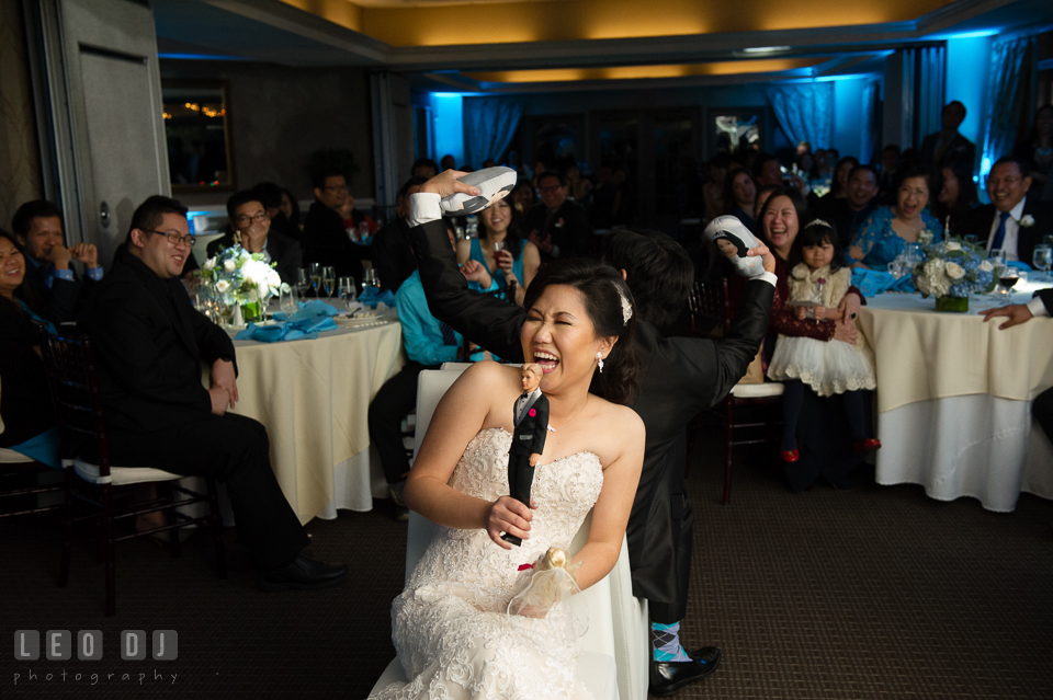 Hidden Creek Country Club Bride laughing doing Bride and Groom Shoe game photo by Leo Dj Photography
