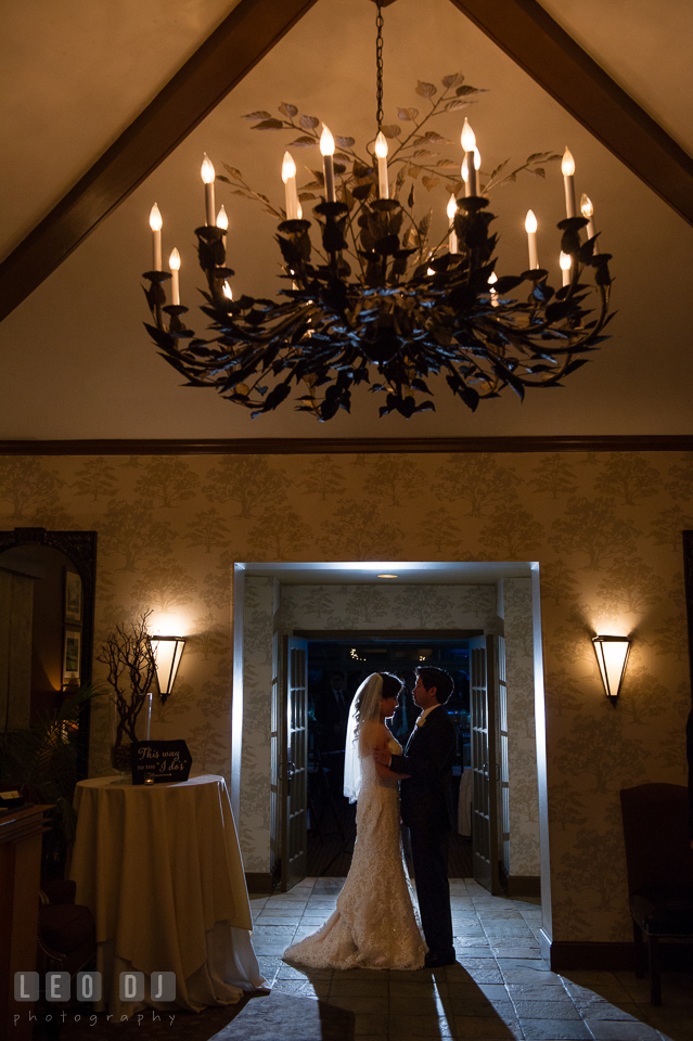 Hidden Creek Country Club Bride and Groom under chandelier silhouette photo by Leo Dj Photography