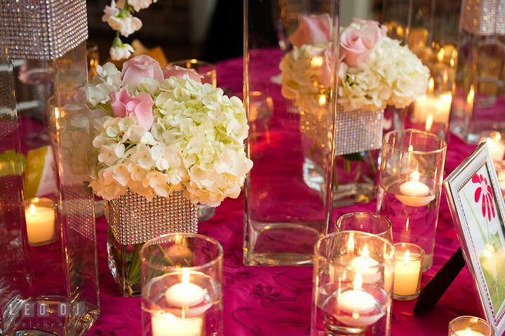 White and pink flowers with tea light candles table decoration. Historic Inns of Annapolis wedding bridal fair photos at Calvert House by photographers of Leo Dj Photography. http://leodjphoto.com