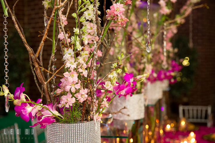 Close up shot of table centerpieces with purple orchids. Historic Inns of Annapolis wedding bridal fair photos at Calvert House by photographers of Leo Dj Photography. http://leodjphoto.com