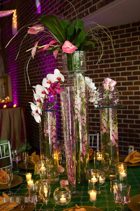 Tall vase centerpieces with white/purple orchids and pink/while flowers. Historic Inns of Annapolis wedding bridal fair photos at Calvert House by photographers of Leo Dj Photography. http://leodjphoto.com