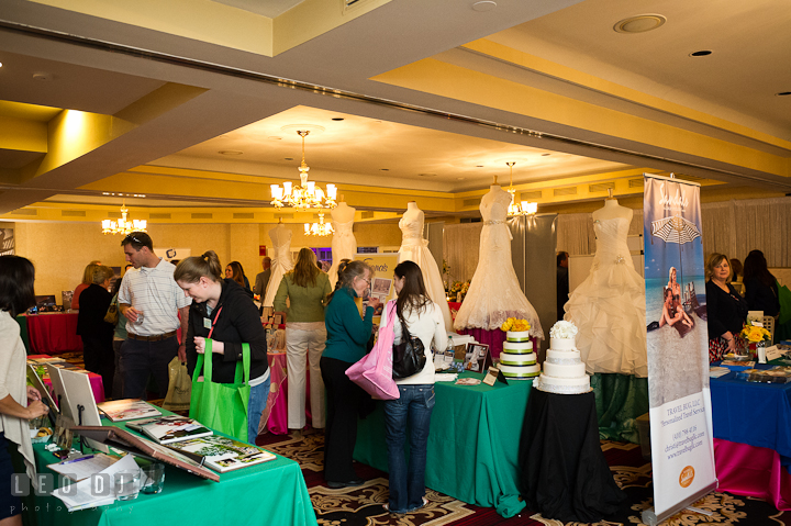 Guests visiting vendor table booths . Historic Inns of Annapolis wedding bridal fair photos at Calvert House by photographers of Leo Dj Photography. http://leodjphoto.com