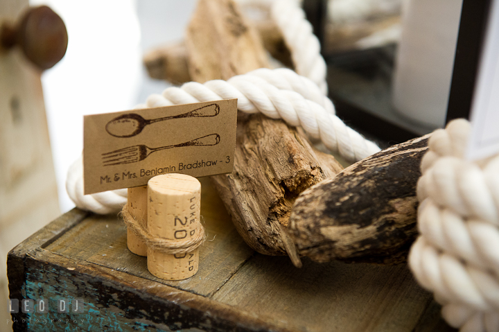 Bride and Groom's name on brown card on wine bottle corks. Historic Inns of Annapolis wedding bridal fair photos at Calvert House by photographers of Leo Dj Photography. http://leodjphoto.com