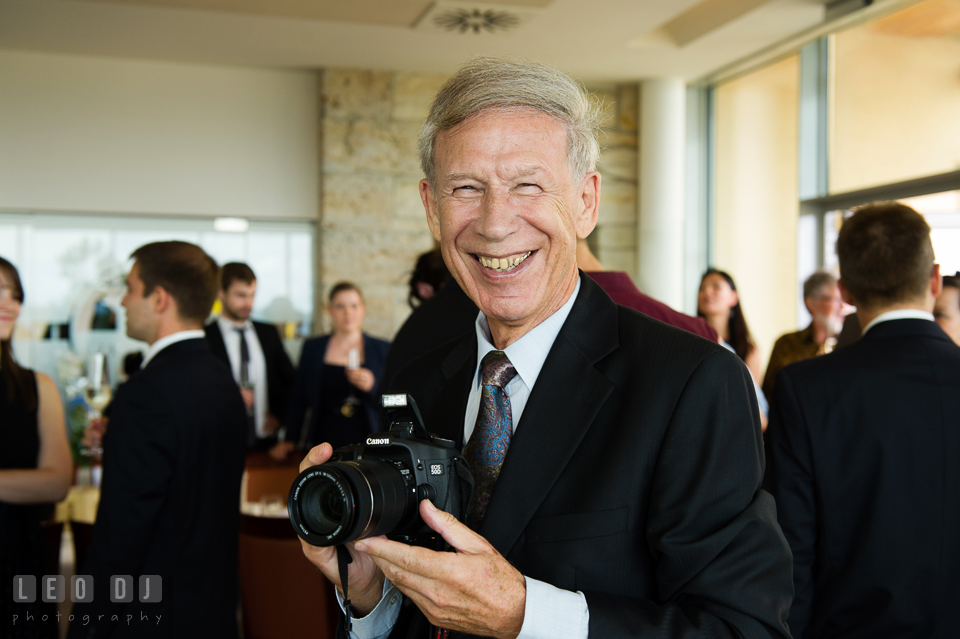 Father of the Groom likes to take pictures. Landgrafen Restaurant, Jena, Germany, wedding reception and ceremony photo, by wedding photographers of Leo Dj Photography. http://leodjphoto.com