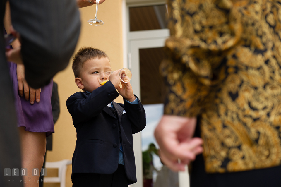 A young boy enjoying himself at the wedding reception. Landgrafen Restaurant, Jena, Germany, wedding reception and ceremony photo, by wedding photographers of Leo Dj Photography. http://leodjphoto.com