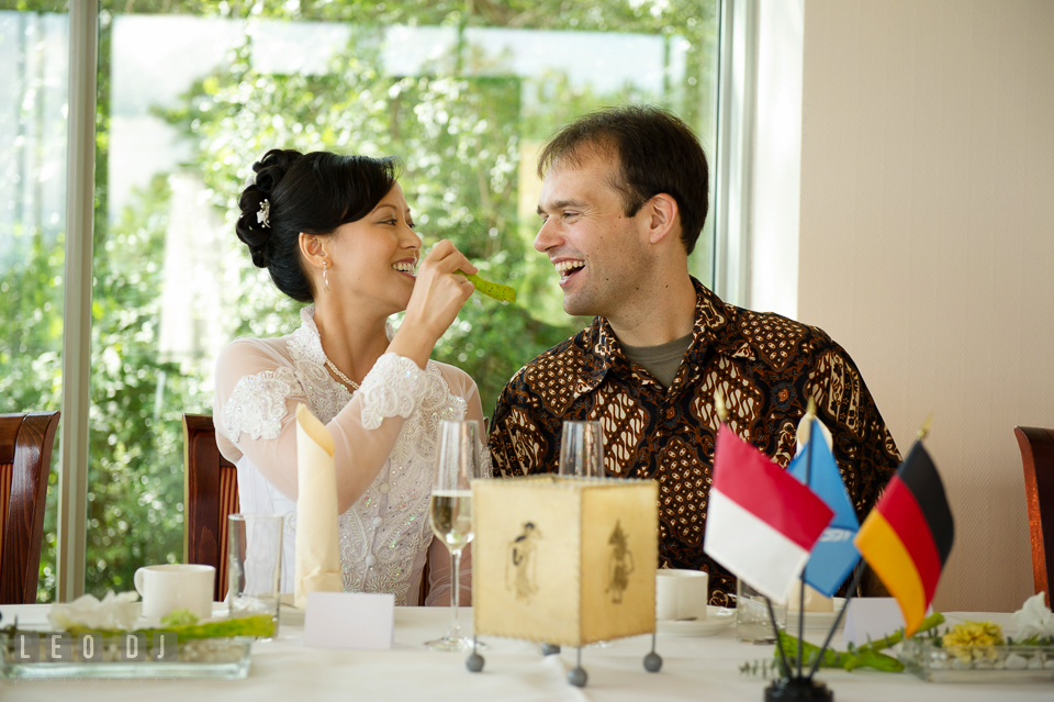 The Bride and Groom having fun during the wedding reception. Landgrafen Restaurant, Jena, Germany, wedding reception and ceremony photo, by wedding photographers of Leo Dj Photography. http://leodjphoto.com