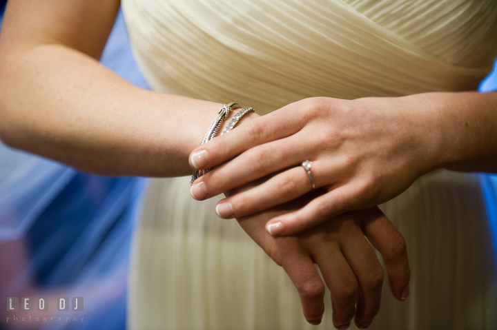 Bride putting on her bracelets. Historic Inns of Annapolis, Governor Calvert House wedding Maryland, by wedding photographers of Leo Dj Photography. http://leodjphoto.com