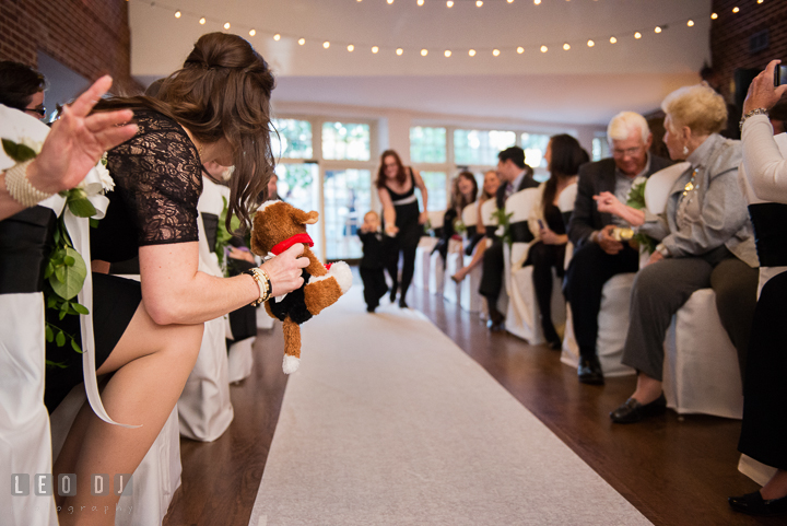 Mother of Ringbearer took out plush toy dog to make her son walk down the aisle. Historic Inns of Annapolis, Governor Calvert House wedding Maryland, by wedding photographers of Leo Dj Photography. http://leodjphoto.com