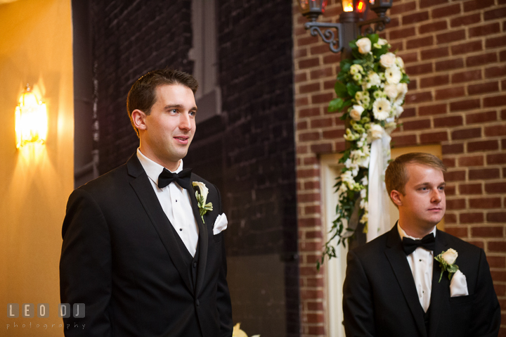 Groom emotional seeing Bride for the first time in her wedding dress during procession. Historic Inns of Annapolis, Governor Calvert House wedding Maryland, by wedding photographers of Leo Dj Photography. http://leodjphoto.com