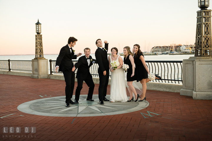 Bride, Groom, Best Man, Maid of Honor, Groomsman, and Bridesmaid doing silly group shot pose. Historic Inns of Annapolis, Governor Calvert House wedding Maryland, by wedding photographers of Leo Dj Photography. http://leodjphoto.com