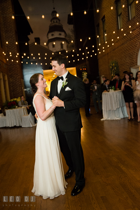 Bride and Groom performing first dance with the Maryland State Capitol building image in the background. Historic Inns of Annapolis, Governor Calvert House wedding Maryland, by wedding photographers of Leo Dj Photography. http://leodjphoto.com