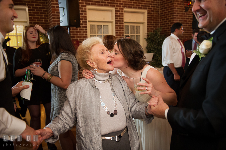 Bride kissed Grandmother on the cheeck during open dance. Historic Inns of Annapolis, Governor Calvert House wedding Maryland, by wedding photographers of Leo Dj Photography. http://leodjphoto.com