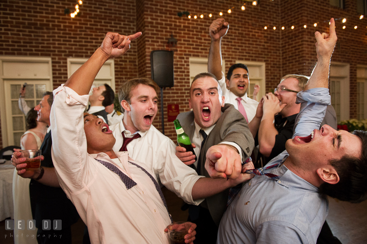 Guys singing loud and acting goofy and crazy during open dance. Historic Inns of Annapolis, Governor Calvert House wedding Maryland, by wedding photographers of Leo Dj Photography. http://leodjphoto.com