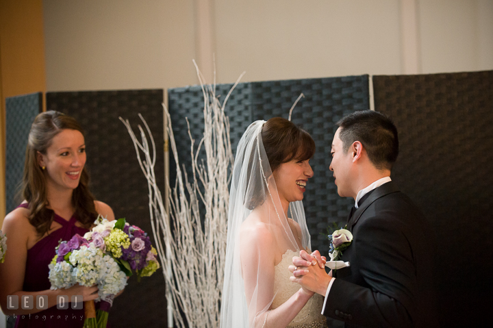 Bride and Groom standing close and holding hands. Falls Church Virginia 2941 Restaurant wedding ceremony photo, by wedding photographers of Leo Dj Photography. http://leodjphoto.com