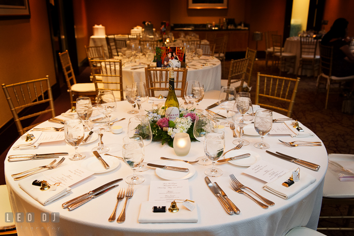 Centerpiece decoration and the table setting. Falls Church Virginia 2941 Restaurant wedding reception photo, by wedding photographers of Leo Dj Photography. http://leodjphoto.com