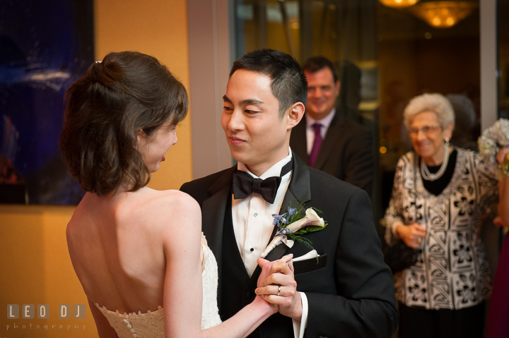 Groom looking at Bride during first dance. Falls Church Virginia 2941 Restaurant wedding reception photo, by wedding photographers of Leo Dj Photography. http://leodjphoto.com