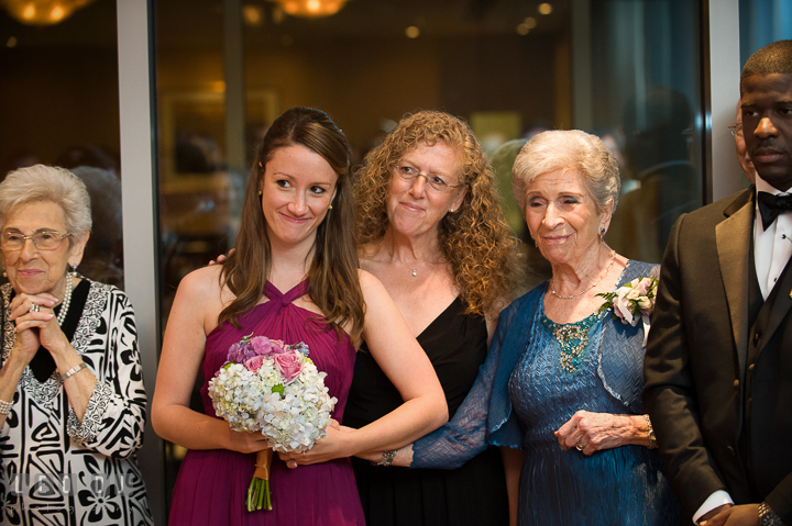 Maid of Honor and Grandmother's in awe seeing Bride and Groom first dance. Falls Church Virginia 2941 Restaurant wedding reception photo, by wedding photographers of Leo Dj Photography. http://leodjphoto.com
